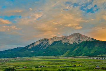 Pastoral Valley of Crested Butte with a bright sunrise