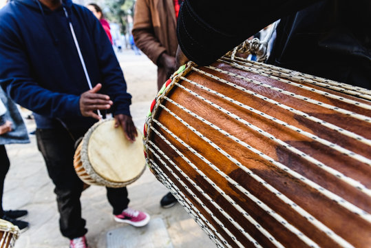 African drummers blowing their bongos on the street.