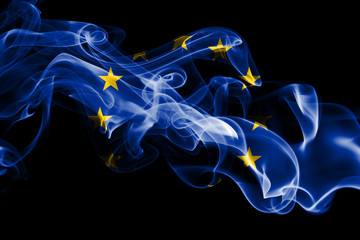 National flag of European Union made from colored smoke isolated on black background. Abstract silky wave background.