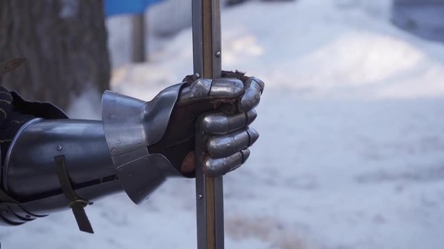 hand of iron knight 14-15 centuries on the background of snow