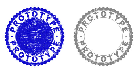 Grunge PROTOTYPE stamp seals isolated on a white background. Rosette seals with grunge texture in blue and grey colors. Vector rubber stamp imprint of PROTOTYPE caption inside round rosette.