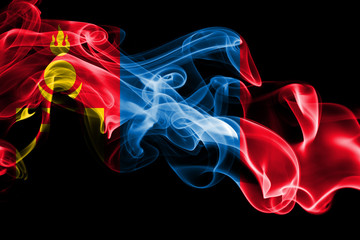 Obraz premium National flag of Mongolia made from colored smoke isolated on black background. Abstract silky wave background.