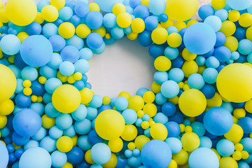 background of balloons in yellow and blue. place for inscription