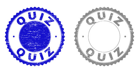 Grunge QUIZ stamp seals isolated on a white background. Rosette seals with grunge texture in blue and gray colors. Vector rubber stamp imitation of QUIZ tag inside round rosette.