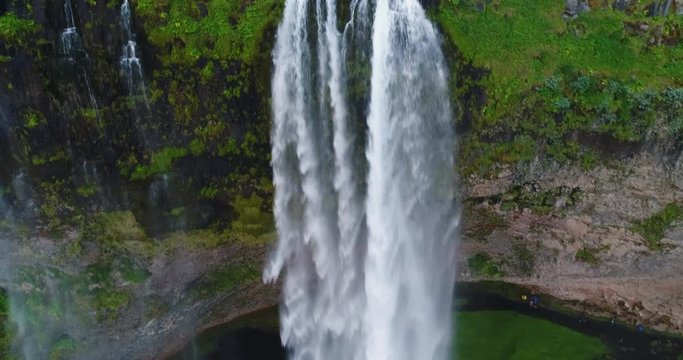 Iceland Aerial drone video of waterfall Seljalandsfoss in Icelandic nature. Famous tourist attractions and landmarks destinations in Icelandic nature landscape in South Iceland.