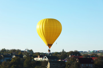 Beautiful view of hot air balloon flying over countryside