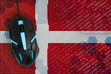 Denmark flag  and computer mouse. Digital threat, illegal actions on the Internet