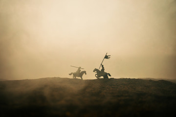 Medieval battle scene with cavalry and infantry. Silhouettes of figures as separate objects, fight...