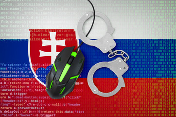 Slovakia flag  and handcuffed computer mouse. Combating computer crime, hackers and piracy
