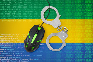 Gabon flag  and handcuffed computer mouse. Combating computer crime, hackers and piracy