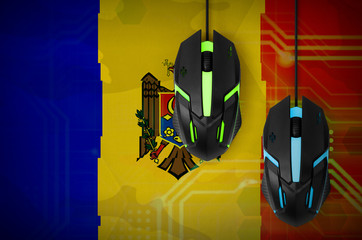Moldova flag  and two mice with backlight. Online cooperative games. Cyber sport team