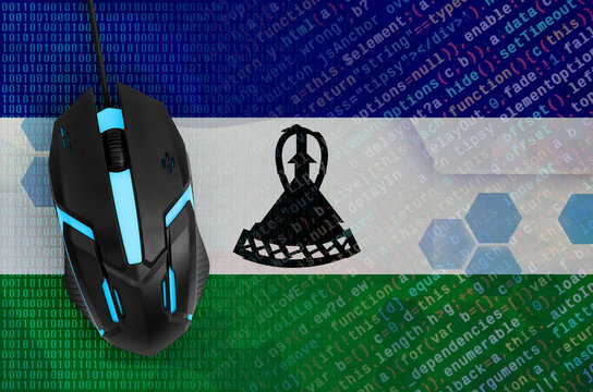 Lesotho flag and computer mouse. Digital threat, illegal actions on the Internet - Powered by Adobe