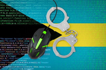 Bahamas flag  and handcuffed computer mouse. Combating computer crime, hackers and piracy