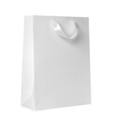 Paper shopping bag isolated on white. Mock up for design
