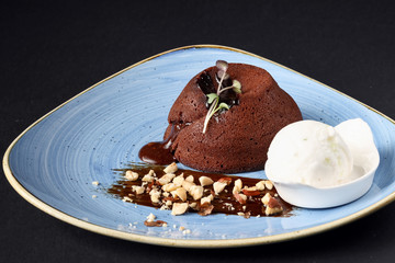 Chocolate souffle with vanilla ice cream.