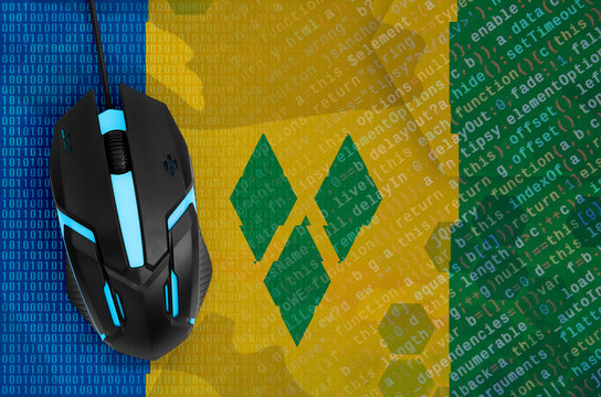 Saint Vincent and the Grenadines flag and computer mouse. Digital threat, illegal actions on the Internet - Powered by Adobe