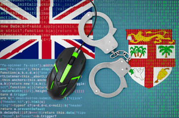Fiji flag  and handcuffed computer mouse. Combating computer crime, hackers and piracy