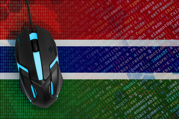 Gambia flag  and computer mouse. Digital threat, illegal actions on the Internet