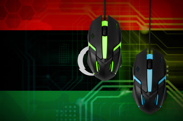 Libya flag  and two mice with backlight. Online cooperative games. Cyber sport team