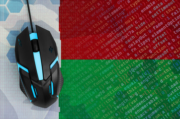 Madagascar flag  and computer mouse. Digital threat, illegal actions on the Internet