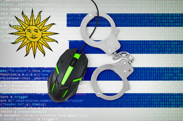 Uruguay flag  and handcuffed computer mouse. Combating computer crime, hackers and piracy