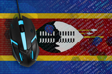 Swaziland flag  and computer mouse. Digital threat, illegal actions on the Internet