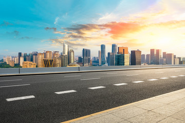 Panoramic city skyline and buildings with empty asphalt road in Hangzhou