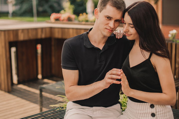 Loving couple hugging in the street.