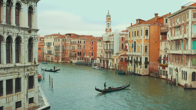 Gandola and Boats at Canal in Venice, Italy