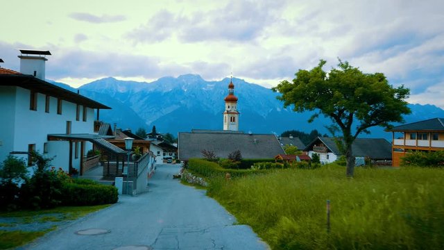Beautiful summer view to Alps in small village in Tirol, Austria