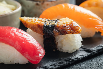 Sushi set of salmon, tuna and smoked eel.
