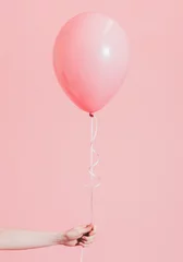 Fotobehang Girl with a pink helium balloon © Rawpixel.com