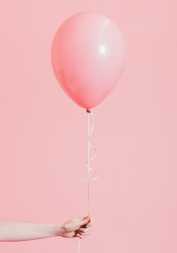 Girl With A Pink Helium Balloon