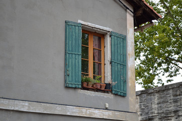 french window with shutters