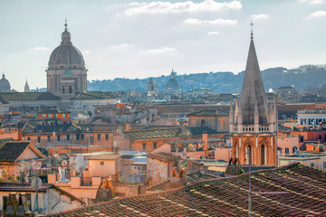 Obraz premium aerial view of old roofs and dome of Rome