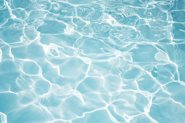 Texture of water in swimming pool for background