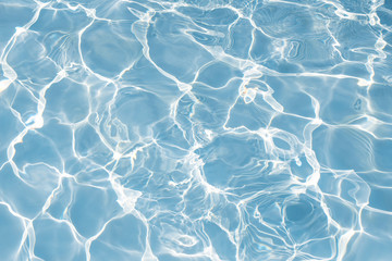 Texture of water in swimming pool for background
