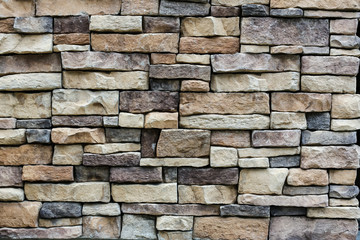 the stone wall texture background natural color.Background of stone wall texture photo.Natural...
