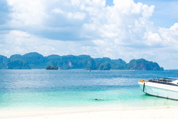 Fototapeta premium A Thai long tail boat on the beach of Andaman sea located at Krabi near Phuket, Thailand