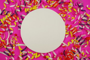 Flat Lay colorful celebration background with confetti on Pink background