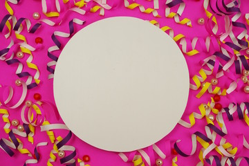 Flat Lay colorful celebration background with confetti on Pink background