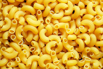 Close Up Dry Macaroni Pasta Texture Background.