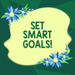 Writing note showing Set Smart Goals. Business photo showcasing Establish achievable objectives Make good business plans Blank Uneven Color Shape with Flowers Border for Cards Invitation Ads