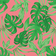 Tropical green leaves living coral background