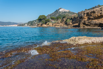 Fototapeta na wymiar Blue Mediterranean Sea on the Rocky Southern Italian Coast on a Sunny Day
