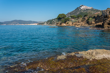 Fototapeta premium Blue Mediterranean Sea on the Rocky Southern Italian Coast on a Sunny Day