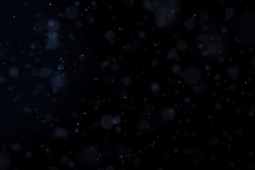 Obraz premium Floating light atmospheric particles isolated on black overlay. May be used on top of the layers in screen mode.