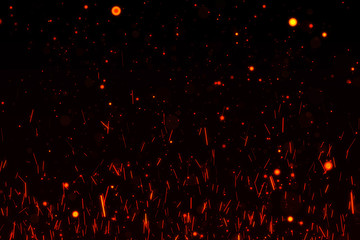 Plakat Fire particles isolated on black background overlay. Put it over your image in screen mode.