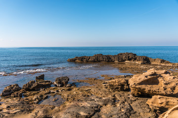 Blue Mediterranean Sea on the Rocky Southern Italian Coast on a Sunny Day