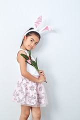 little girl holding bouquet tulip